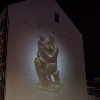 Image of Henry Moore's 'Mother & Child' projected onto the culture wall at the launch of the public realm arts project.