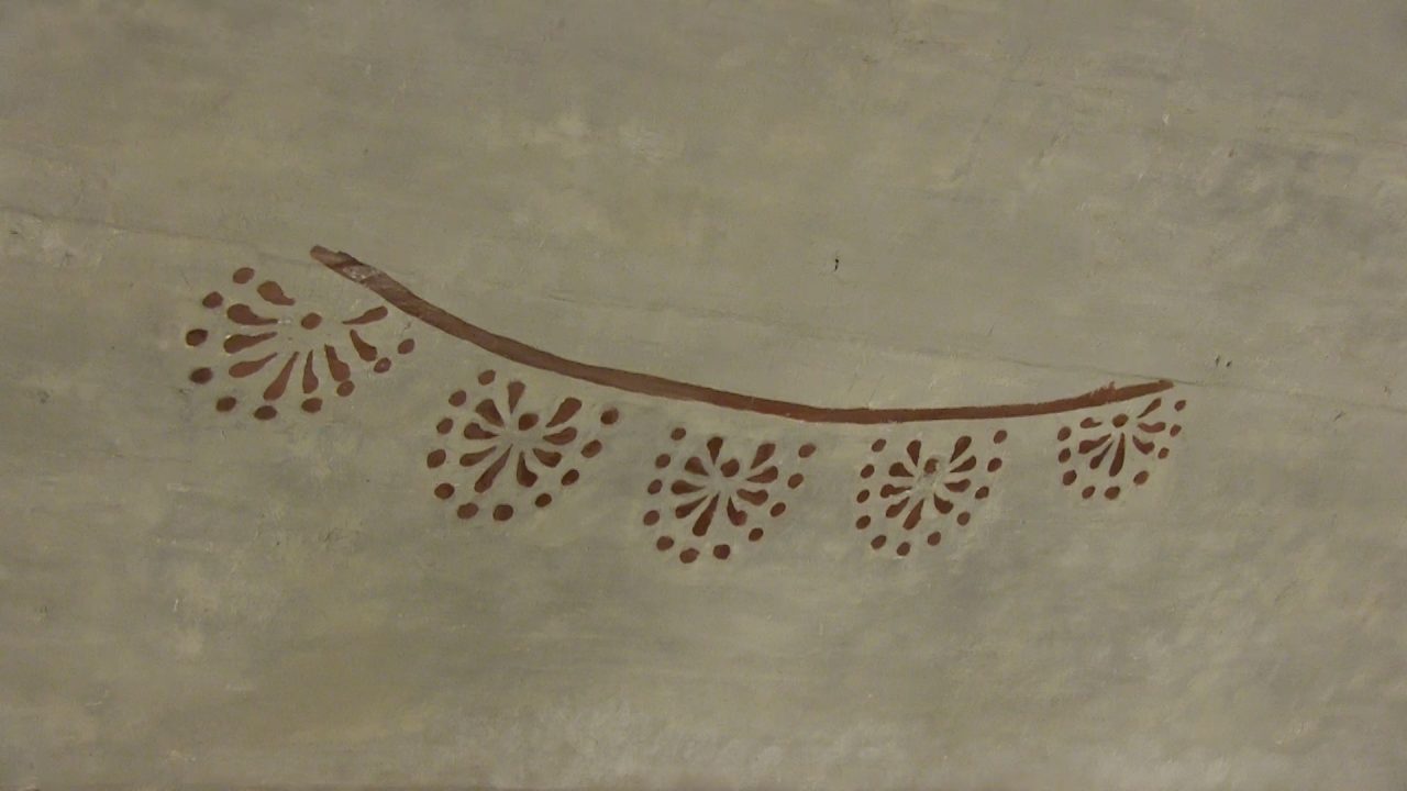 Patterned detail of wall fresco in Poland
